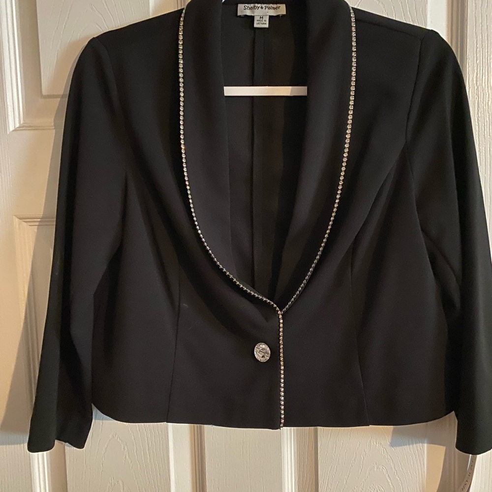 Black crop jacket with rhinestone accents